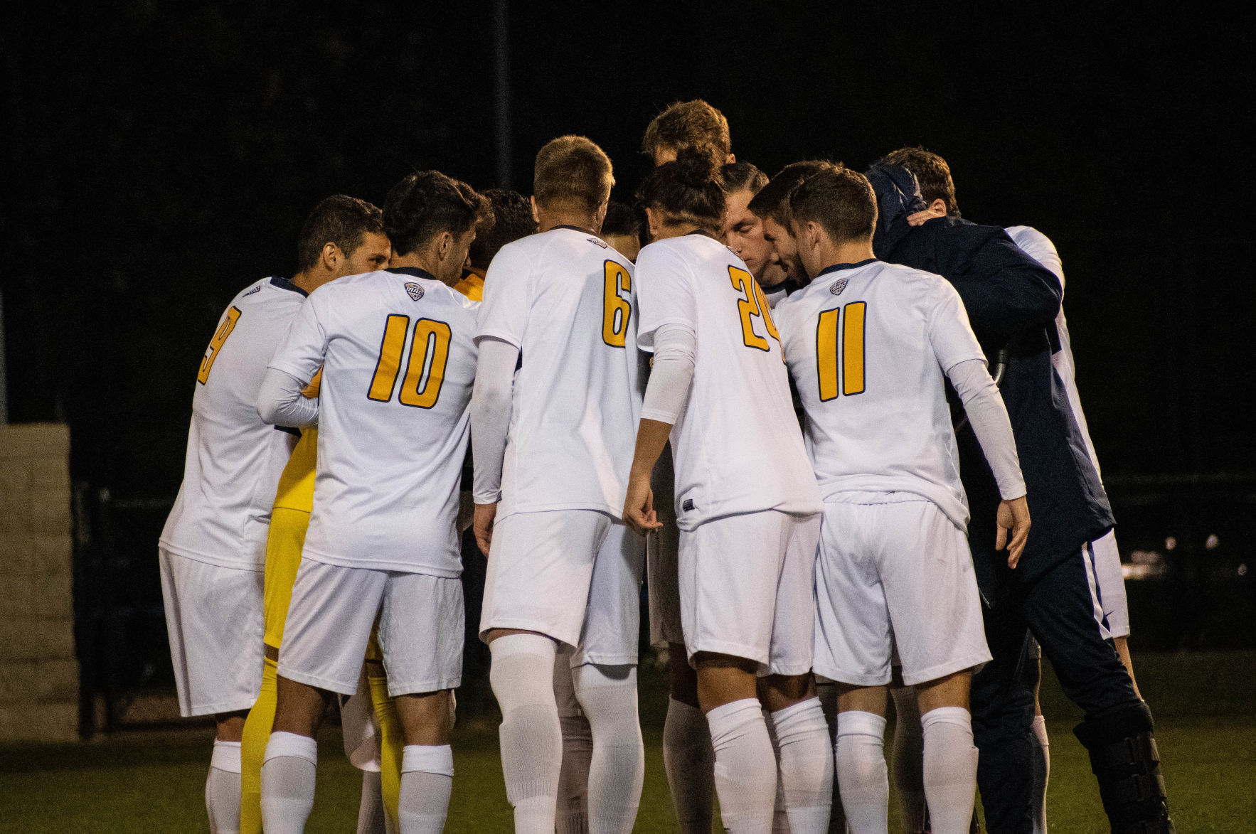 Members of the West Virginia men's soccer team huddle up prior to taking on Northern Illinois at Dick Dlesk Soccer Stadium on October 18, 2019.